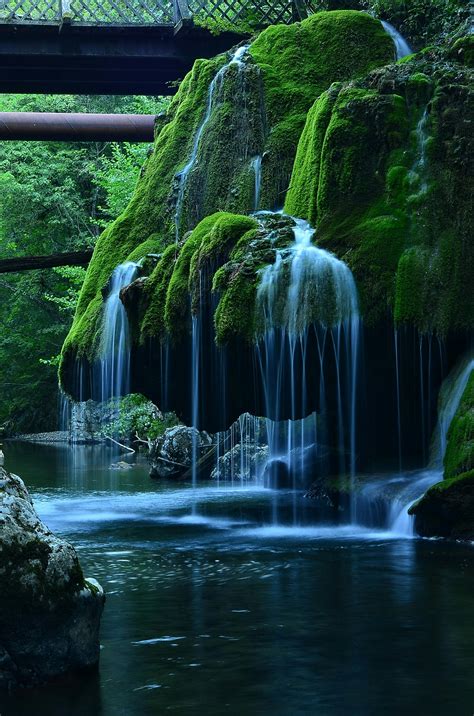 Time-Lapse Photo of Waterfalls in Mossy Rock Formation · Free Stock Photo