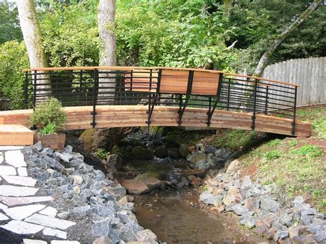 Contemporary Arched Foot Bridge With Bench | Garden bridge design, Farmhouse landscaping, Garden ...