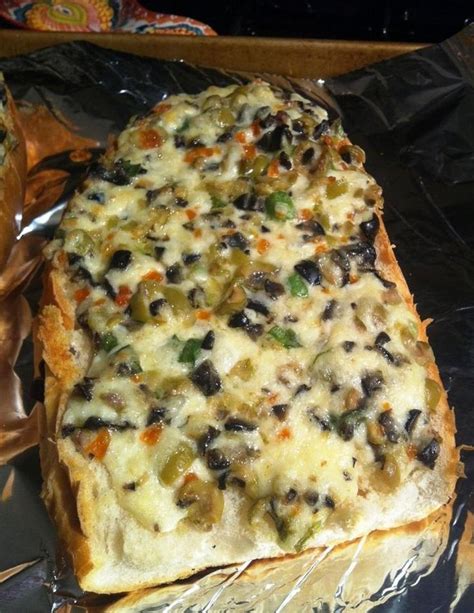 I found this olive cheese bread from Pioneer Woman, and knew I had to make it!! I love olives ...