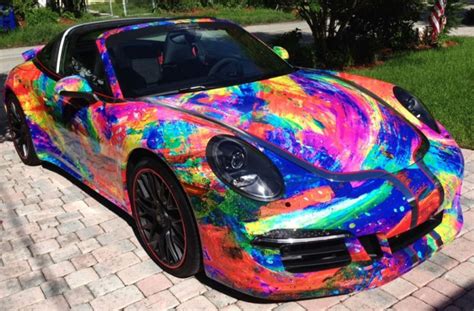 Duaiv reveals painted Porsche in Miami Auto Show - Park West Artists