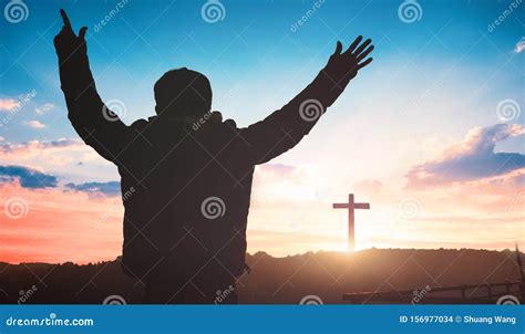 Religious Concept: Christian Worship on Cross Sunrise Background Stock ...