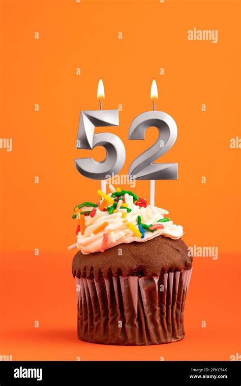 Birthday cake with candle number 52 - Orange foamy background Stock ...