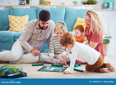 Happy Family Playing Board Games Together at Home Stock Image - Image ...