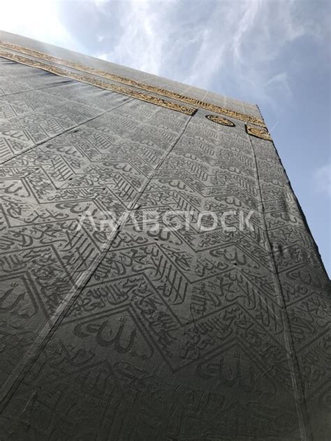 A close-up of the Kaaba in Makkah Al-Mukarramah in the Kingdom of Saudi Arabia, performing Hajj ...