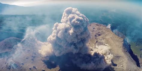 This drone footage of a volcano erupting is insane - Business Insider