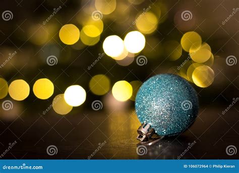 Christmas Bauble with Christmas Lights Stock Photo - Image of christmas, shiny: 106072964