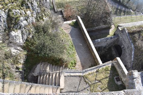 The old stone staircases of the Bastille fortress in grenoble. Stairs leading up to the top of ...