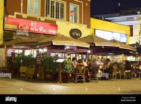 LIMA, PERU - MARCH 5, 2012: Unidentified people at the restaurants Cafe de la Paz, El Tigre and ...