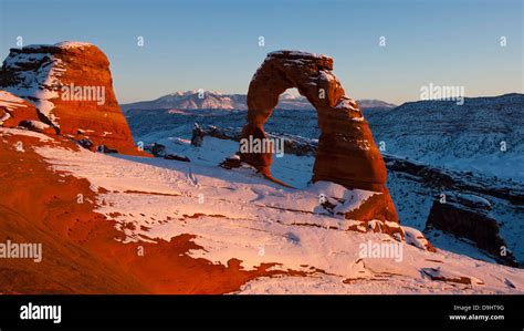 Delicate Arch with snow in winter at sunset, Arches National Park, Utah ...