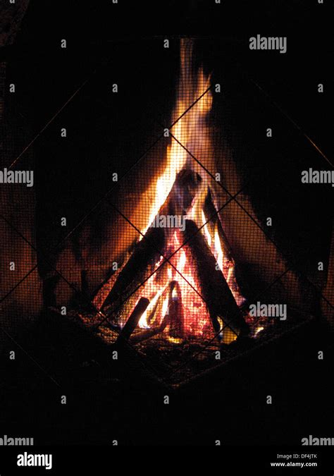 Burning Logs in Fireplace, Close Up Stock Photo - Alamy