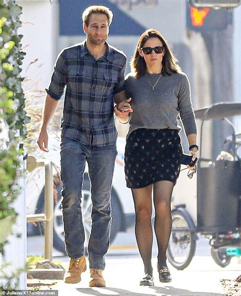 Jennifer Garner and her longtime beau John Miller make a rare sighting in LA as they hold hands ...