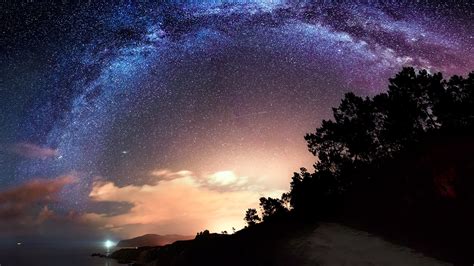 Milky way arch over the sea and the trees in Galicia, Spain | Windows ...