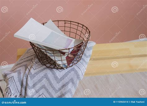 Magazine Basket with Magazines on a Wooden Bench Stock Photo - Image of modern, bedroom: 115965414
