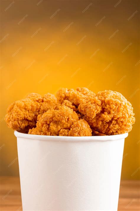 Premium Photo | Crispy fried chicken in the bucket Chicken bucket