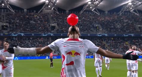 Chelsea target Christopher Nkunku pulls balloon out of sock in ...