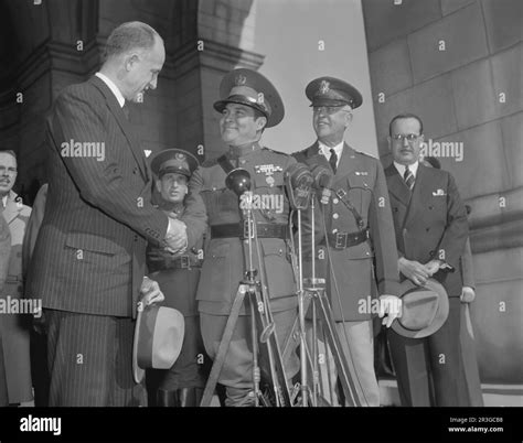 Shaking hands with dictator Black and White Stock Photos & Images - Alamy