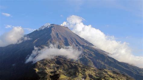 Tungurahua Volcano and the town of Banos in the Pastaza Valley, Ecuador ...