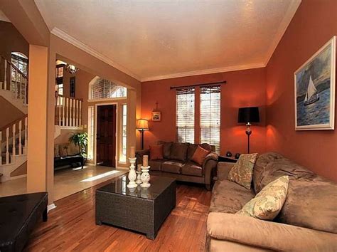 grey walls brown furniture | Warm living room colors, Living room warm, Living room paint