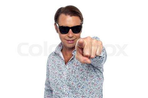 Smart looking man pointing at the camera | Stock image | Colourbox