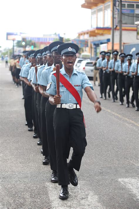 Members of the Guyana Police Force Traffic Department march along Camp ...