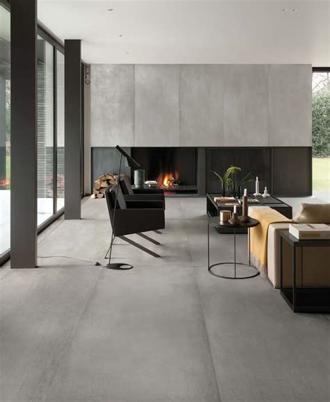 Cement look porcelain tiles | Living room tiles, Tile floor living room, Luxury living room