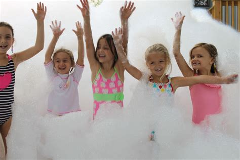 Smile for the photo. We love the foam machine. | Foam party, Backyard ...