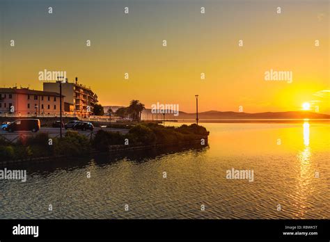 View of Orbetello in lagoon on peninsula Argentario at sunrise. Tuscany ...