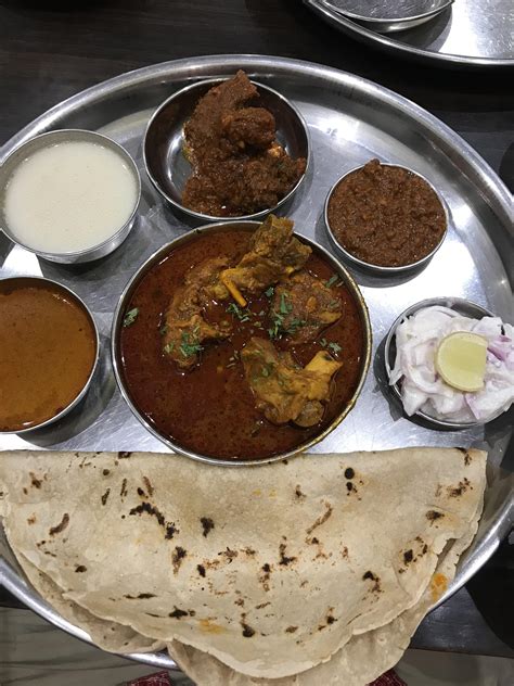 [I ate] Maratha Mutton Thali: mutton curry, sukka mutton, mince mutton, onion Rita, bhakhri ...