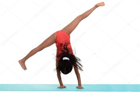 Young black girl doing gymnastics cartwheel motion blur — Stock Photo © mcgphoto #12905303