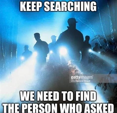 some people are standing in the dark with their lights on and one ...