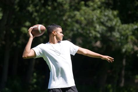 How to Throw a Football for Distance | Livestrong.com