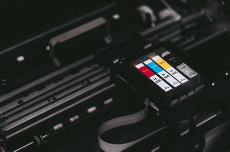 CMYK Ink Cartridges in a Printer Free Stock Photo | picjumbo