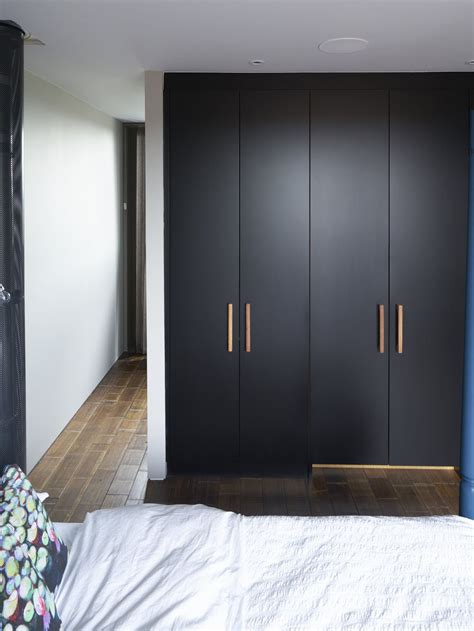 Black Matt Lacquer Wardrobes with bespoke oak handles | Bedroom ...