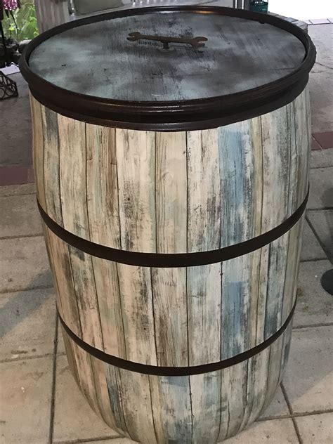 Took a plastic 55 gal plastic drum and made it look like an ole whiskey barrel. | 55 gallon ...