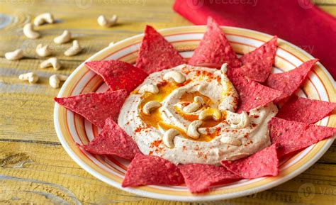 Hummus with tortilla chips 24216421 Stock Photo at Vecteezy