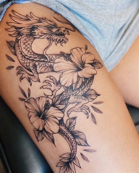 Pin by lexis. on tattoo inspo. | Leg tattoos women, Thigh tattoos women, Dragon tattoo for women