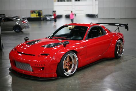 Rocket Bunny RX7 three quarter view | Carros japoneses, Carros e motos ...