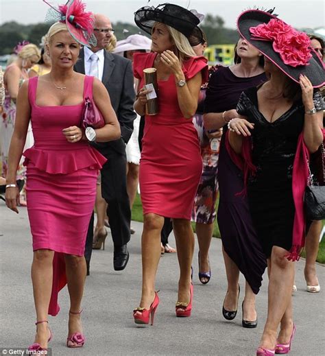 Doncaster fillies fight the freeze on Ladies Day at the races as they ...