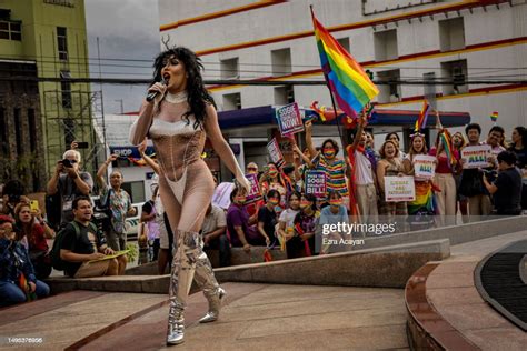 Drag queen Lumina Klum performs as activists take part in a protest ...