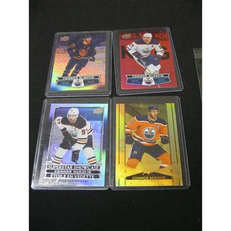 4 CONNOR MCDAVID HOCKEY CARDS - Dodds Auction