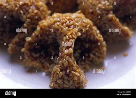 sticky rice sweet ball in triangle shape top with sesame dimsum from ...