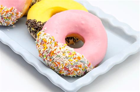 Premium Photo | Colorful donuts with sprinkles