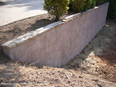 How To Improve The Look Of A Concrete Retaining Wall | Concrete retaining walls, Landscaping ...