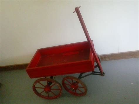 I love this little red wagon. Picture taken on July 2016 | Little red wagon, Red wagon, Wheelbarrow