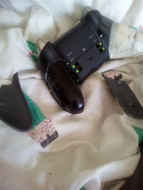 The rubber grips on my elite series 2 controller have fallen off, the other side I patched up ...