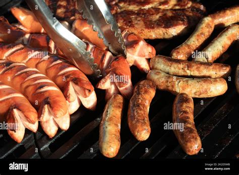 German Bratwurst on Barbecue Grill Stock Photo - Alamy