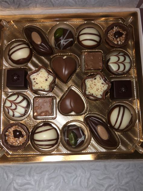 Assorted Chocolate Pralines in a Gold Box