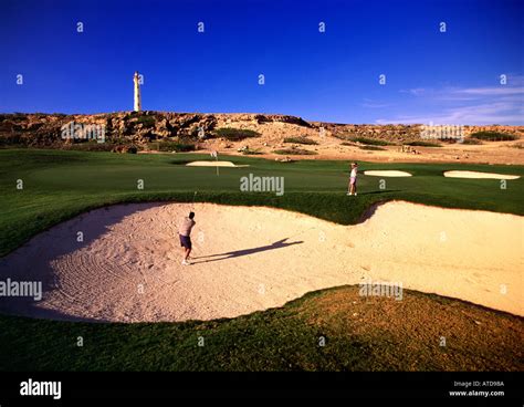 Two men golfing at Tierra Del Sol Golf Course Aruba Stock Photo: 1694137 - Alamy