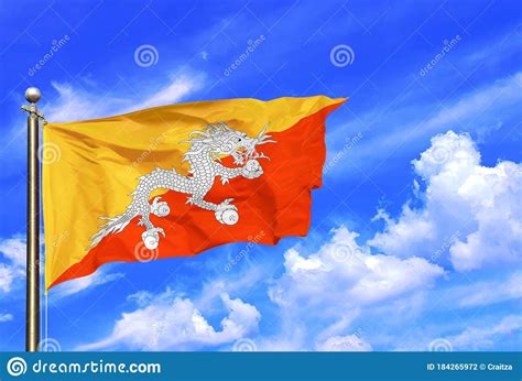 Bhutan Yellow Orange White Dragon National Flag Waving In The Wind On A ...