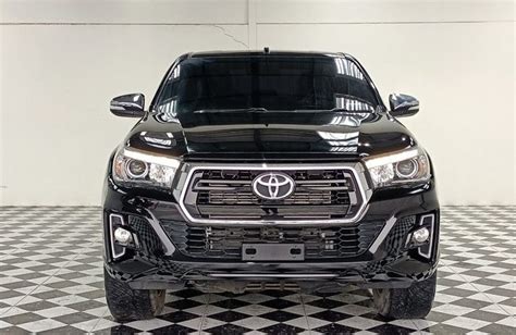 TOYOTA HILUX VIGO CHAMP BLACK | Mirza Enterprises Japan